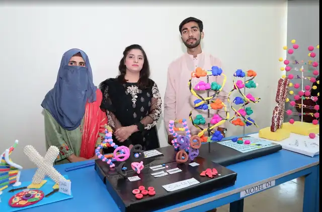 Students with their DNA models